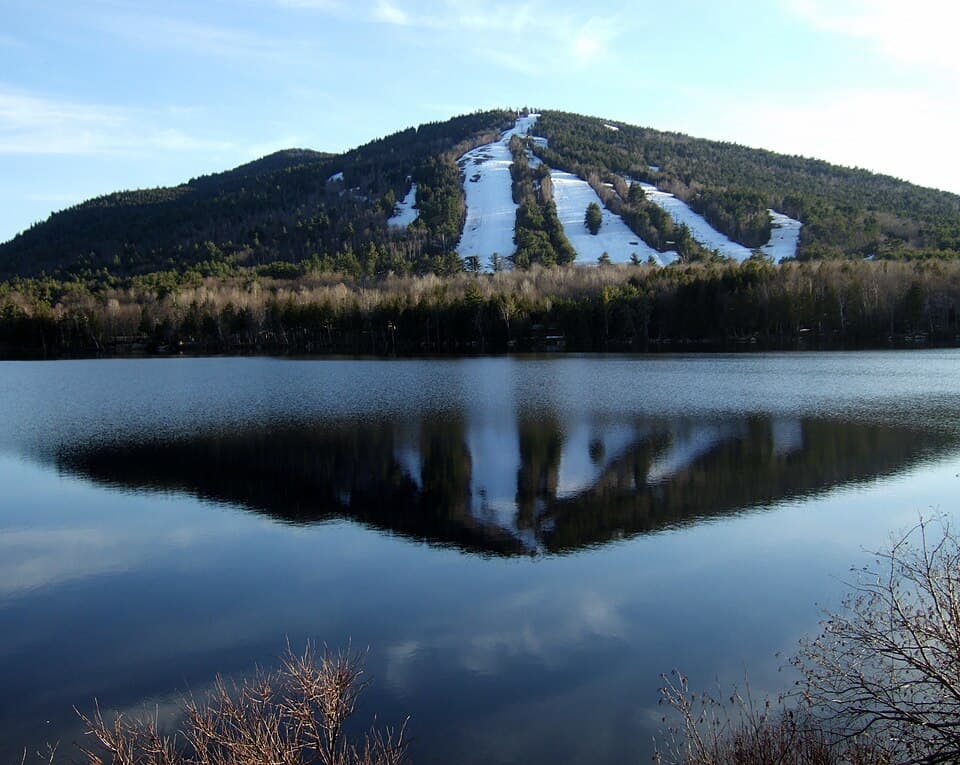 Pleasant Mountain's ski trails seen across Moose Pond
