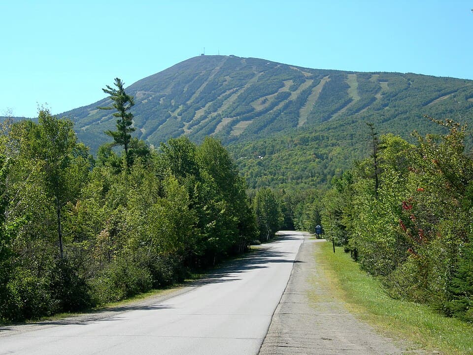 Sugarloaf's ski trails seen from the access road in summer